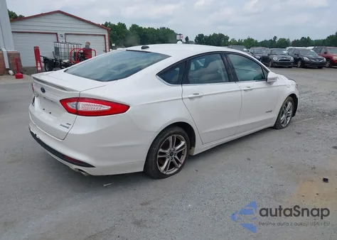 2015 Ford Fusion Hybrid Se z USA, uszkodzony, nr VIN 3FA6P0LU2FR305597